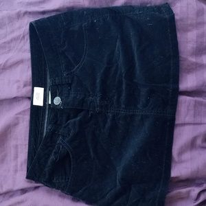 Black mini velvety jean style skirt. Jacob connection